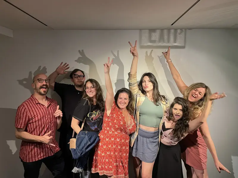 The A Little Local Flavor team taking a goofy group photo after a team outing at Gray and Dudley