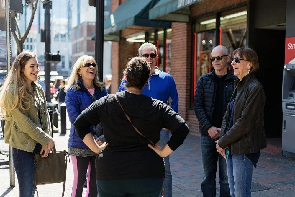 A Little Local Flavor corporate food tour group enjoying a meal in downtown Nashville