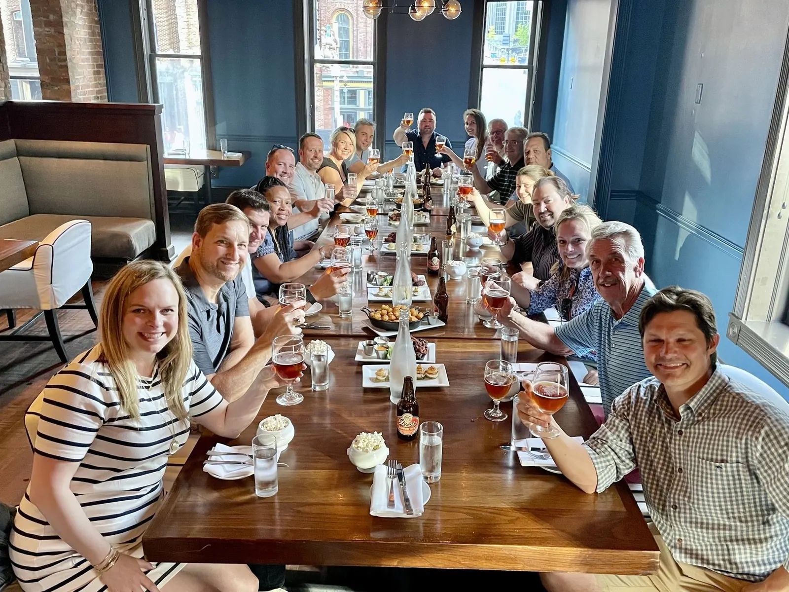 A corporate team on a private A Little Local Flavor food tour at Merchants in downtown Nashville