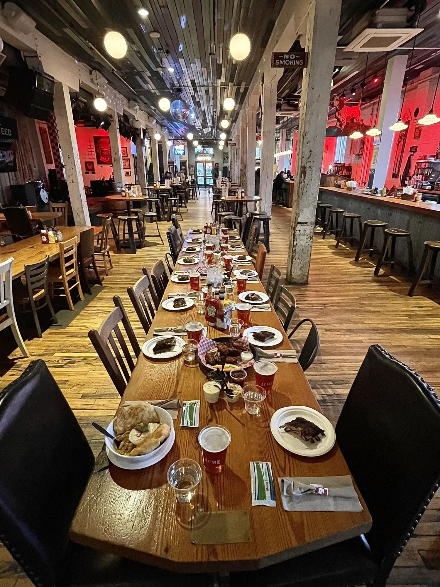 A private group toasting together on an A Little Local Flavor food tour in downtown Nashville
