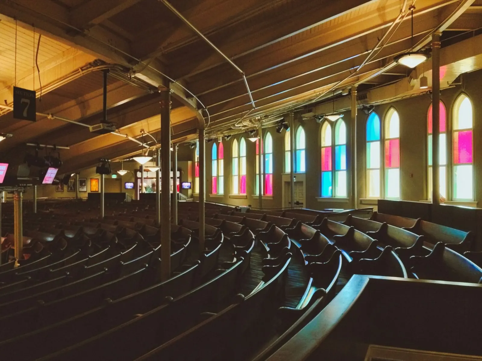 Interior of the Ryman Auditorium with stained glass windows, downtown Nashville