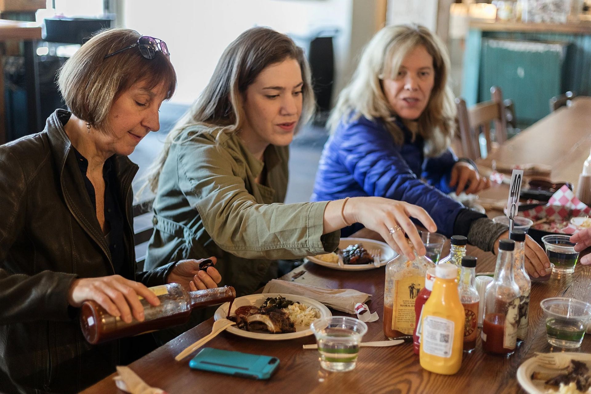 Guests sharing a tasting table on an A Little Local Flavor food tour